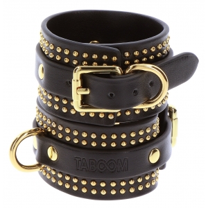 Menottes de poignets STUDDED VOGUE Noires et dorées