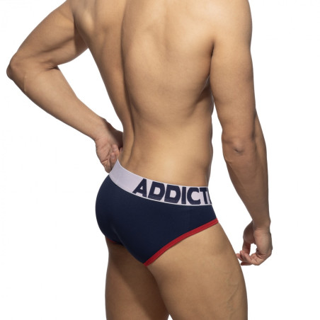Slip TOMMY PIQUE bleu marine et rouge de Addicted