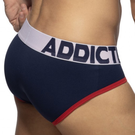 Slip TOMMY PIQUE bleu marine et rouge de Addicted